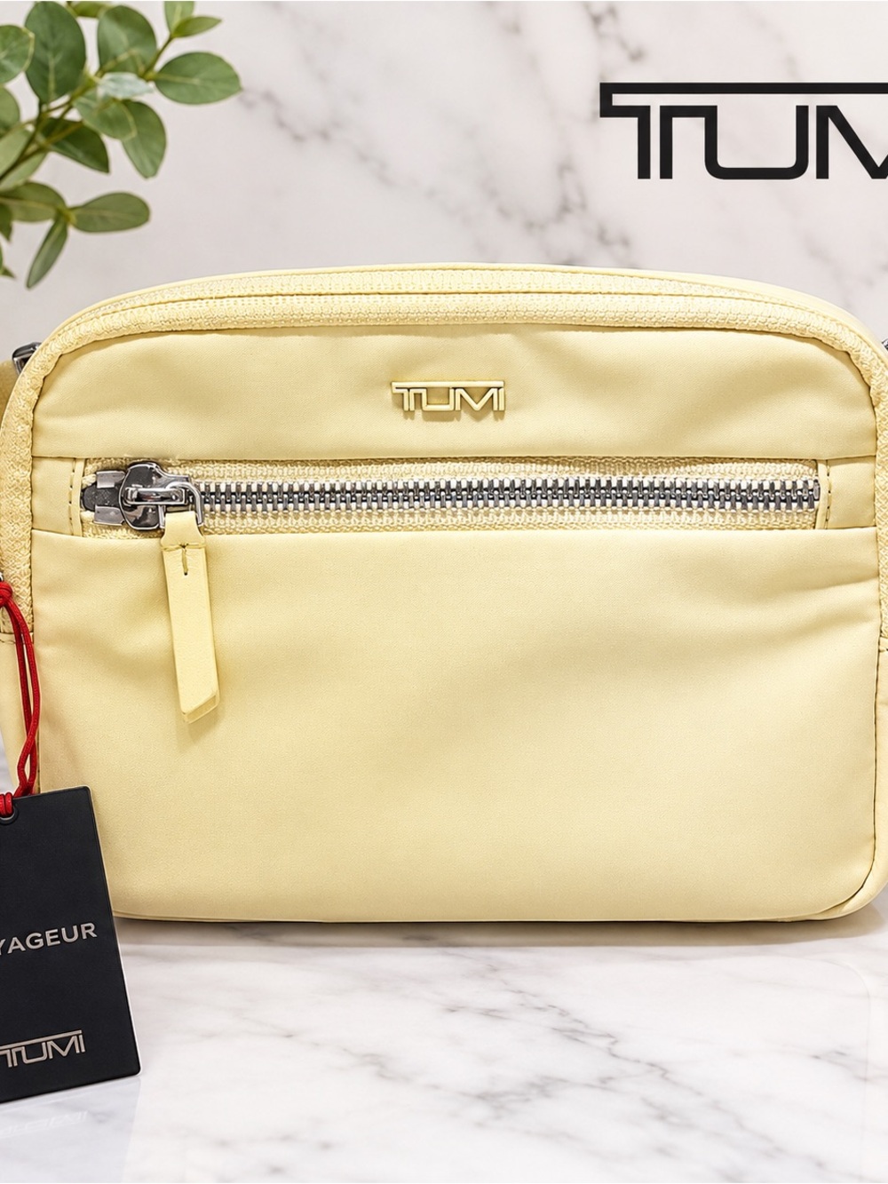 Tumi Pale Yellow Belt Bag with Silver Hardware